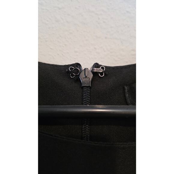 Stunning Forever 21 Black Peplum Top with Beaded Shoulders - Picture 5 of 7